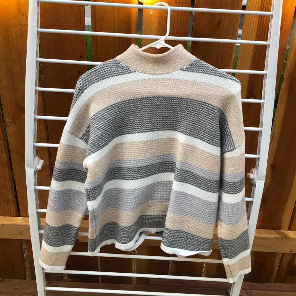 Striped long sleeve sweater.